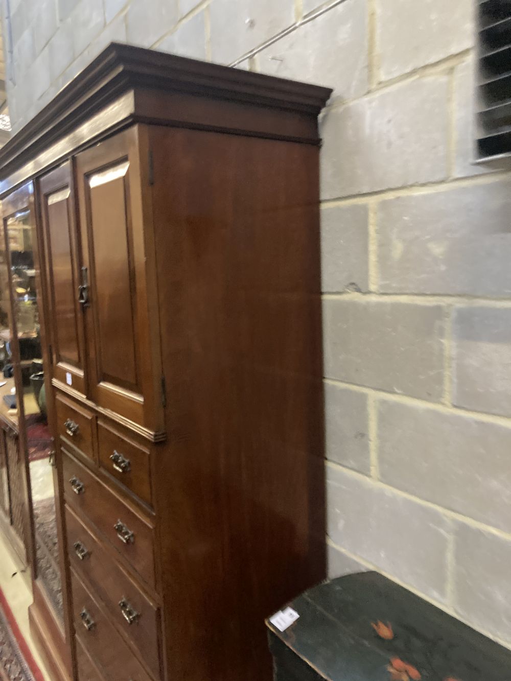 An Edwardian walnut wardrobe, width 161cm depth 56cm height 209cm